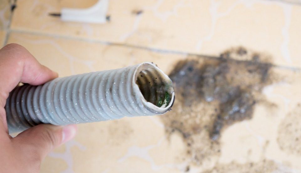 đường ống xả bị kẹt do sơ vải